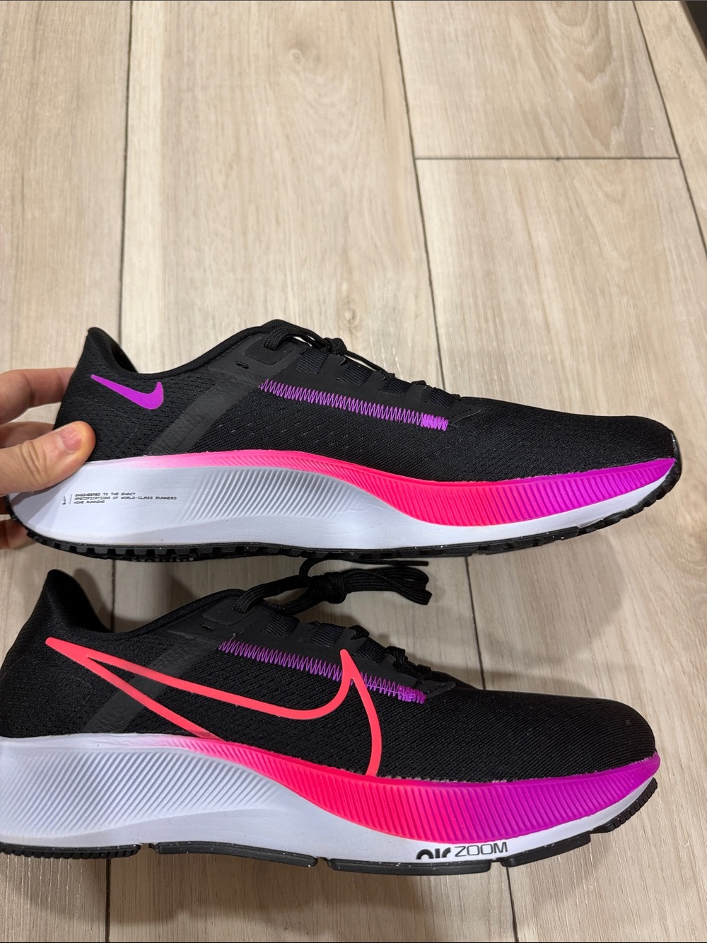 Nike Women’s Black Running Shoes with Pink and Magenta Accents